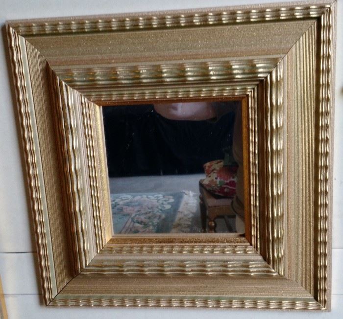 one of two 12"  X 12" square gold framed mirrors