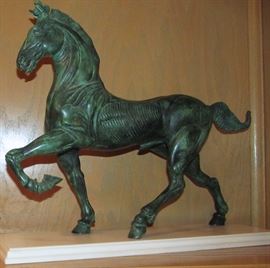 Ludovico De Luigi - a late 20th Century green patinated cast bronze figure of a stylized horse numbered 50/1000