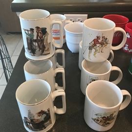 2 Different sets of Norman Rockwell Mugs