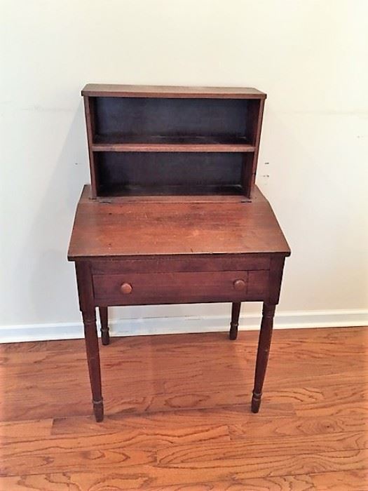 Antique desk with raised top and shelves