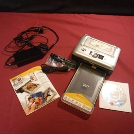 Kodak Easy Share and accessories          http://www.ctonlineauctions.com/detail.asp?id=739834