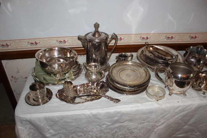 Silverplated serving pieces--bowls, pitcher, trays, etc.