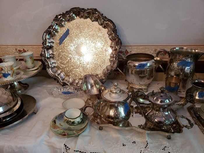 Lots of silverplate--trays, cream and sugar sets, water pitchers, and more