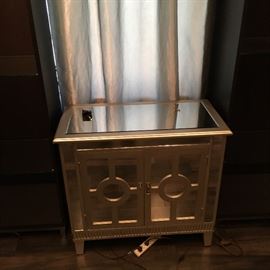 Night stand/side table, mirrored front, double doors in silver painted finish.