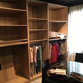 Set of three IKEA closet units (needs doors) complete with glass and wood shelves, hang bars in each unit, two outer units with thin sock or accessory drawers. Used as a display unit in showroom