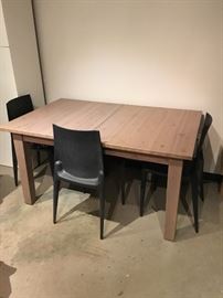 Table with expanding top, gray/taupe pickle finish, gently used with four Bellini chairs included 