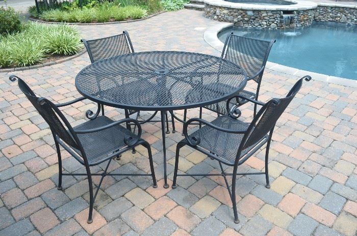 wrought iron table w/ 4 chairs