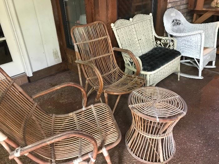 Patio furniture, including wicker rocker, Victorian wicker loveseat, Rattan (?) chairs and table