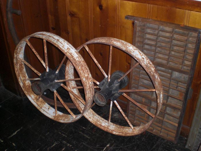 pair of iron cultivator wheels