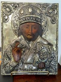 Antique Russian icon on stand.