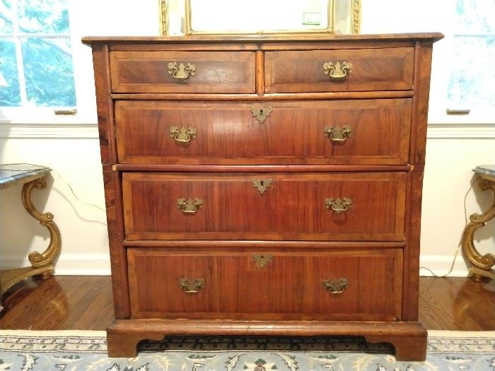 Close-up shot of the English banded wood chest - those are the original brass pulls. 