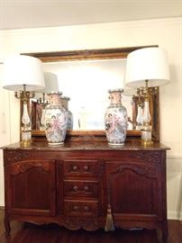 Antique French hand carved marble topped fruitwood server (from Normandy) with original key; two doors, three drawers. Purchased from Patricia Reid Interiors, November, 1994 for $7,900.00.
Yes, she kept ALL of her receipts! Pair of Warren Kessler classical crystal lamps, with new shades (they weren't cheap) ;-)