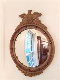 Every Southern home needs a convex eagle mirror like this one - it's wood and nicely vintage.