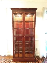 Nice lighted curio cabinet, with five adjustable glass shelves.