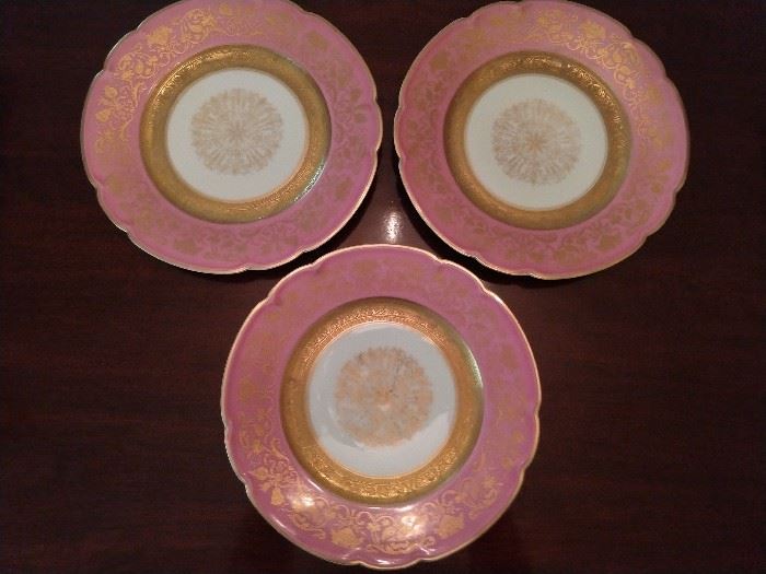 There is a set of eight of these pink rim, w/gold filigree & scalloped edge, 10" Black Knight dinner plates; three pictured for detail. The Black Knight mark was used between about 1925 and 1941 - Graham & Zenger was a New York City based importer and wholesaler. The blanks were originally manufactured then designed and painted by the Hutschenreuther Porcelain Factories to be imported. It is believed in the late 1930's, the company transferred their decorating company to the US while still buying their blanks from Germany. At the outbreak of WWII, Graham and Zenger and their Black Knight China brand ceased trading.