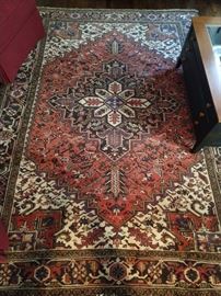 Vintage hand woven Persian Heriz rug, 100% wool face, measures 7' x 9' 6".