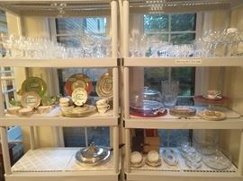 Not a good close-up, but your looking at very good Baccarat stemware, along with some smaller sets of good china.