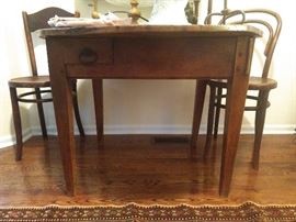 Check out the "hidden" drawer on the underside of the table. There's also a panel, on the right side, that slides open for your secret Swiss bank account.