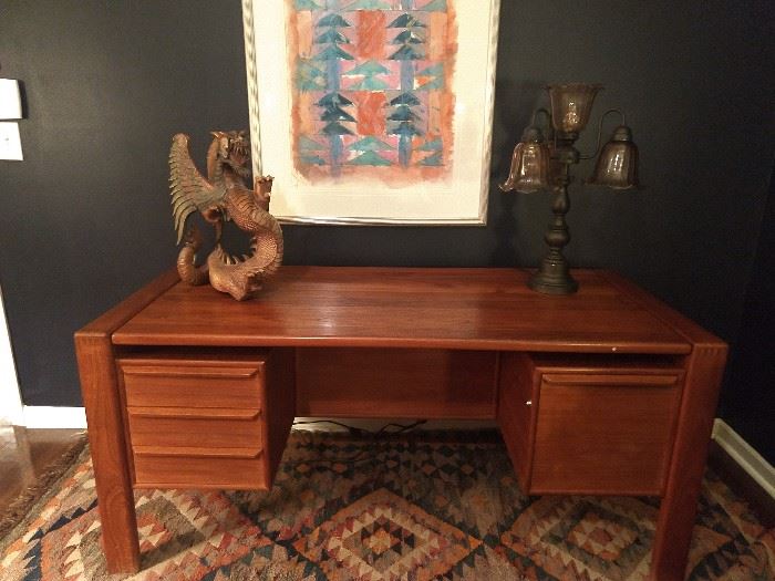 Vintage Danish 4-drawer teak desk, with hand-carved wooden dragon. Contemporary watercolor, signed C. Saunders, 1985