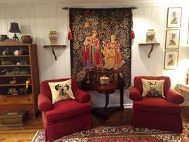 Pair of comfy armchairs that look just like Chairy from Pee Wee's Playhouse. Wonderful 1940's mahogany French table, with gallery top  and carved posts.          Next pic is a close-up of the carved post - I've never seen anything like it - very nice details!                                          Nice French tapestry between the chairs, which is a reproduction of a 10th century original, displayed at the Musee De Cluny, Paris. 