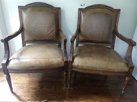 KWAZEE good pair of French leather Bergere chairs. Wouldn't you look good sitting in these.