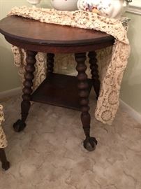 Tiger oak very heavy table with spool legs, claw feet with glass balls
