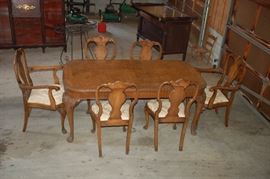 Exquisite burled maple dining room table with 6 chairs