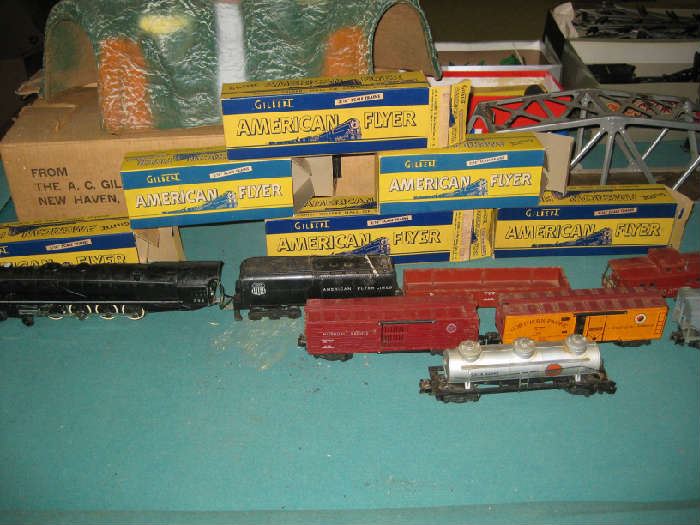 American Flyer train cars, most have orig. boxes and train set has orig. box. Also has transformer & crane