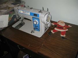 Brother sewing machine in cabinet