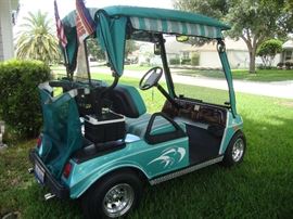 Older Club Car, electric. Good condition, Sunbrella Covers