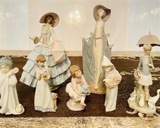 Lladro Figurines: Bundled Bather, Calling A Friend, My Best Friend, Girl With Rooster, Girl With Umbrella, A Stroll In The Sun, and Afternoon Tea