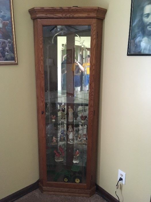 I love this curio cabinet -- would fit in any room.