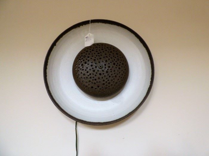 Hand thrown pottery wall lamp