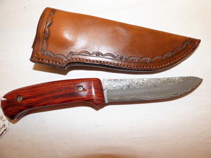 Handmade knife and sheath with damascus steel blade