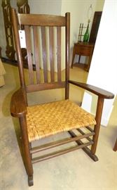 Vintage rocking chair with woven seat
