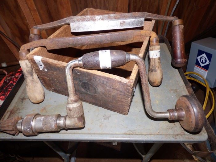 Antique drill with draw knives 