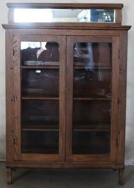 Oak 2 door bookcase w/ mirror