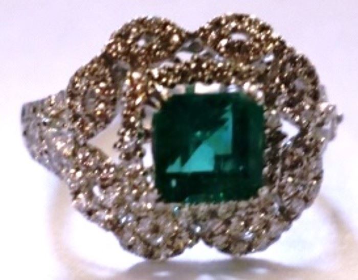 18KT white gold emerald and diamond ring