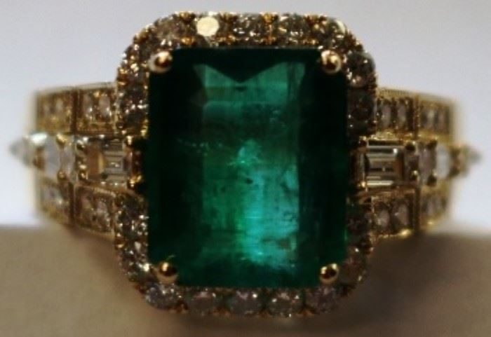 18KT yellow gold emerald and diamond ring