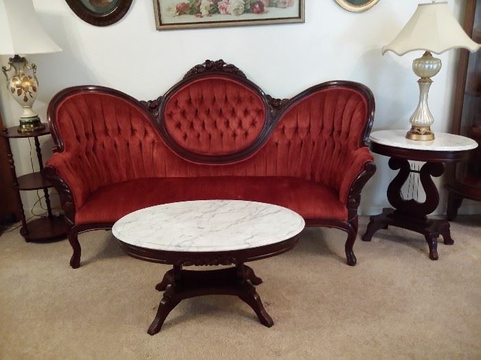 Victorian button tufted sofa with medallion back