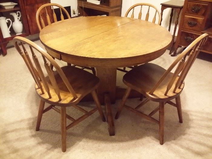 Round oak table - 42 inches across ( plus there are 2 ten inch leaves), 4 maple bentwood chairs