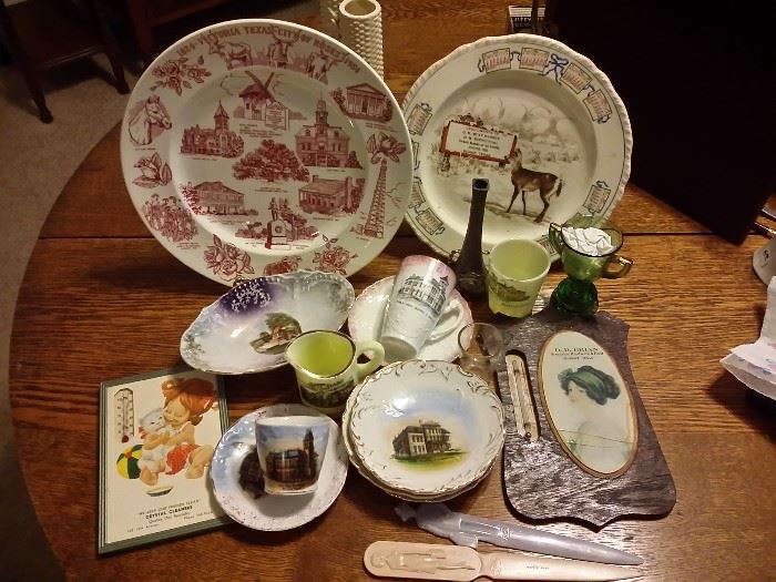Souvenir items - Victoria city hall cup & saucer, Cuero public school cup & saucer, small Alamo pitcher, 1923 calendar plate, Cuero souvenirs, Victoria public school bowls, advertising thermometers