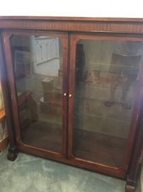 Circa 1910 Empire Revival Display cabinet and Jon's feet in the reflection.