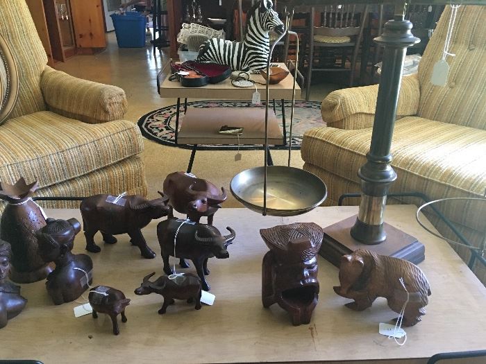Hand-carved wood animals on a circa 1950 Danish Modern table