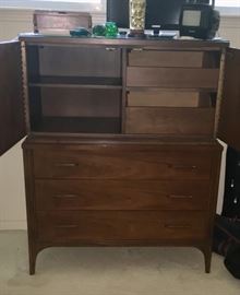 Chest opens up with concealed drawers