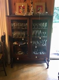 Circa 1920 china cabinet loaded with crystal and glassware
