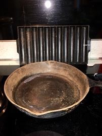Cast iron cooking ware - you clean - we watch