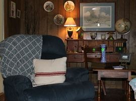 Blue recliner in den.