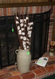 Churn with cotton stalks.