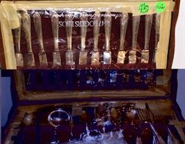 A sterling silver dinner ware set in box.